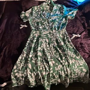 green and white floral pattern flowy pearl white button up dress